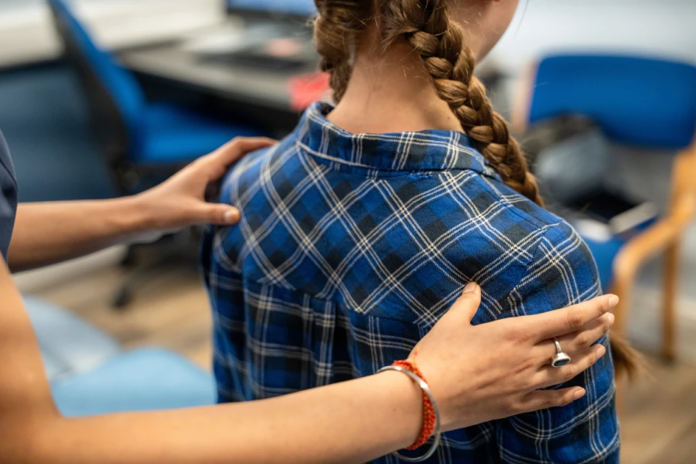 Physiotherapist treating a patient